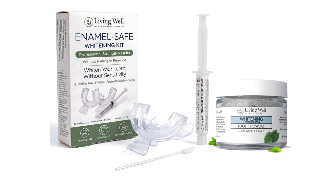 Enamel-Safe Whitening Kit with its gel syringe and moldable trays, next to a jar of Whitening Tooth Powder