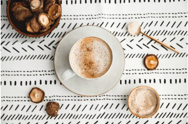 A mug of homemade MUD/WTR mushroom coffee alternative made with cacao, chai spices, turmeric and ginger