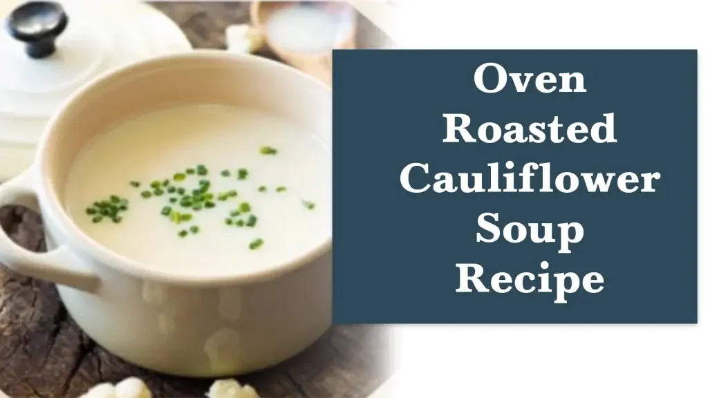 A bowl of creamy oven-roasted cauliflower soup topped with roasted cauliflower florets