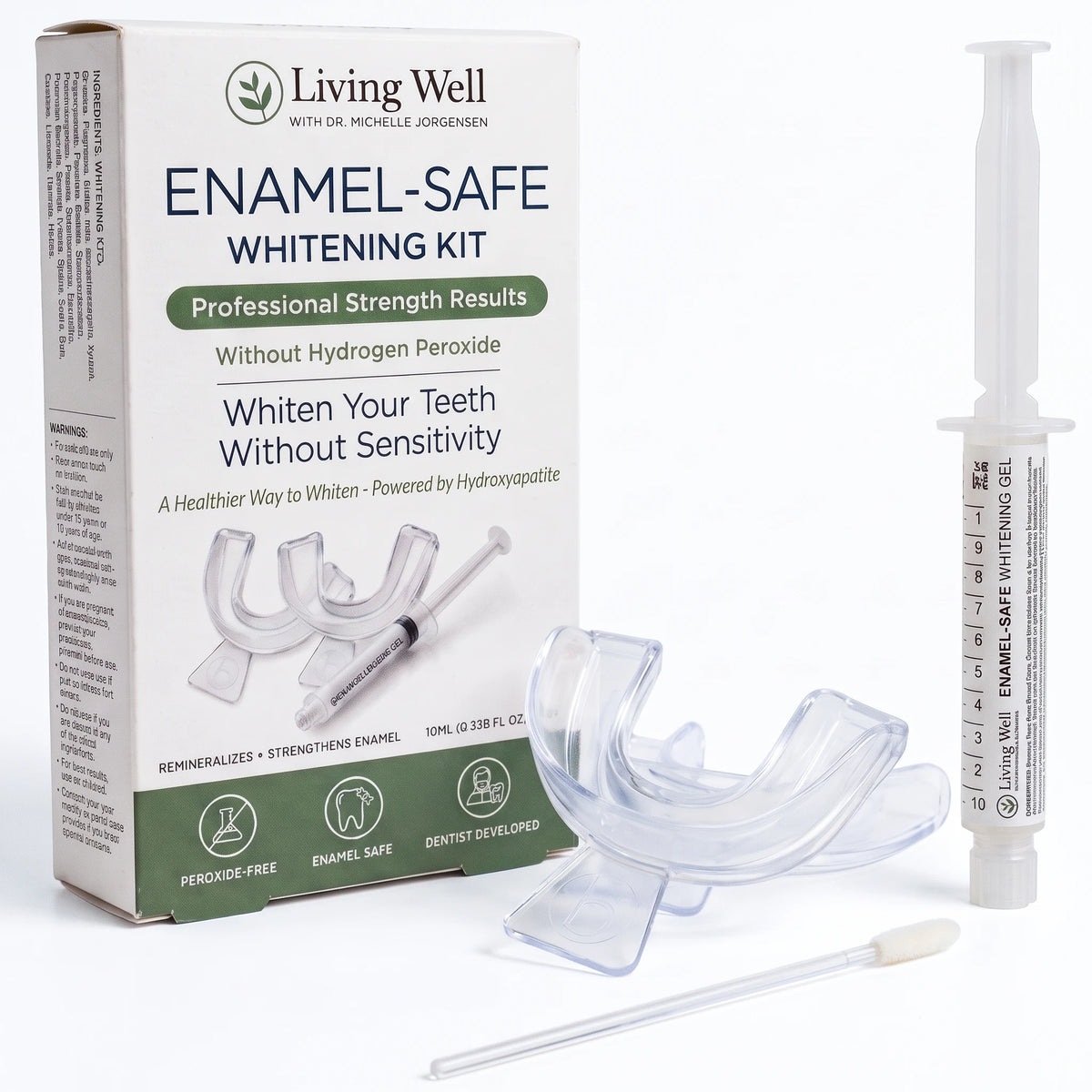 Enamel-Safe Whitening Kit by Living Well with Dr. Michelle: peroxide-free whitening gel syringe with hydroxyapatite, two moldable trays and applicator, shown with the kit box