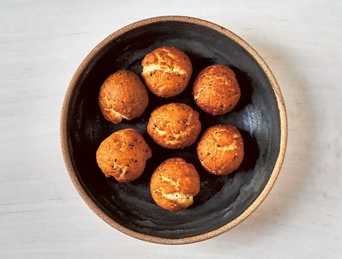 Japanese sesame doughnuts drizzled with caramel sauce