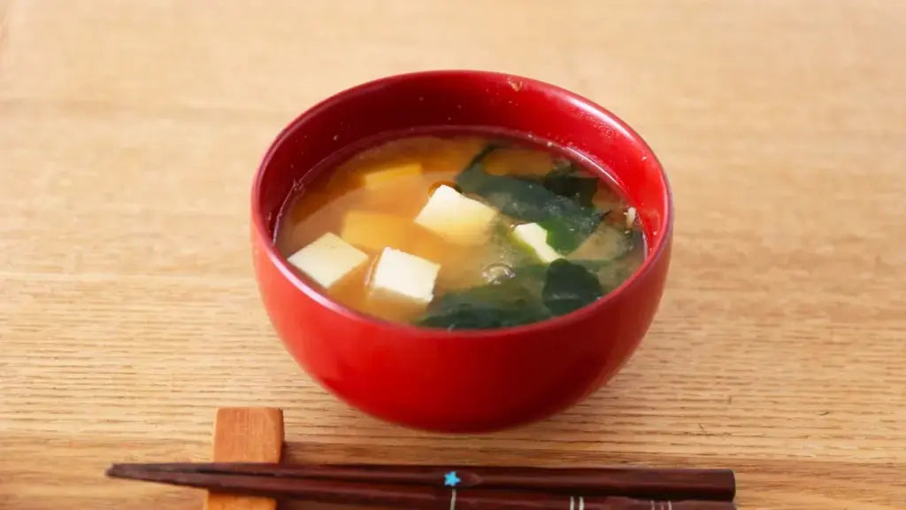 A bowl of homemade miso soup with tofu, wakame and green onion