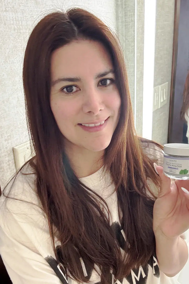 Customer photo shared with a Living Well tooth powder review